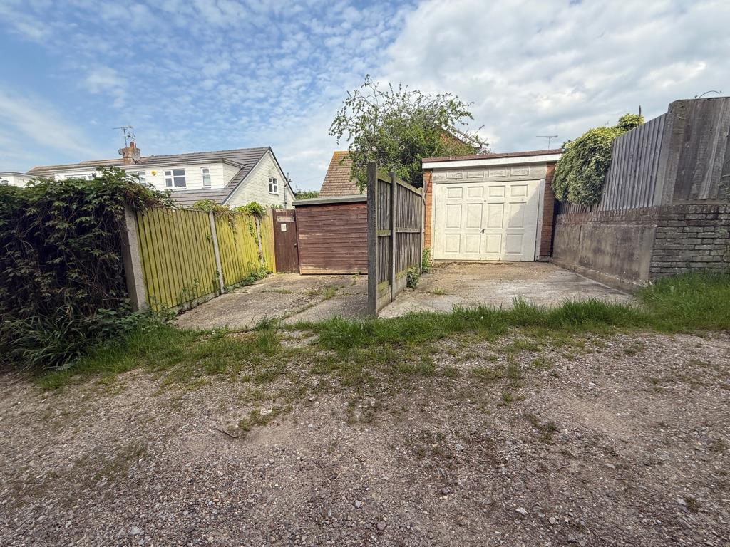 Lot: 100 - DETACHED HOUSE FOR IMPROVEMENT - Garage with up and over door and space in front plus adjacent space leading to rear access of garden